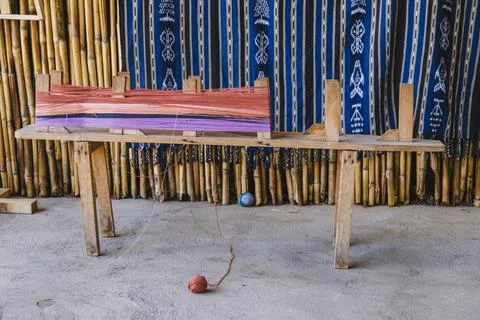 Colored threads put on the loom to weave - interwoven threads Stock Photos