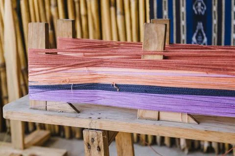 Colored threads put on the loom to weave -  typical fabrics in rural Guatemala Stock Photos