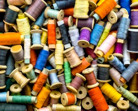 Colored threads for sewing background Stock Photos