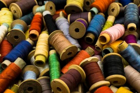 Colored threads for sewing background Stock Photos