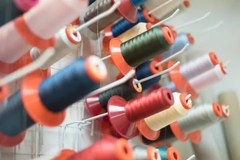 Colored threads for a sewing machine Stock Photos