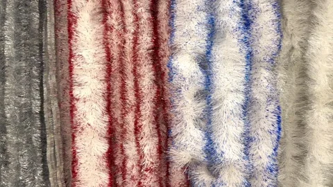 Colored tinsel background Stock Footage 256612725