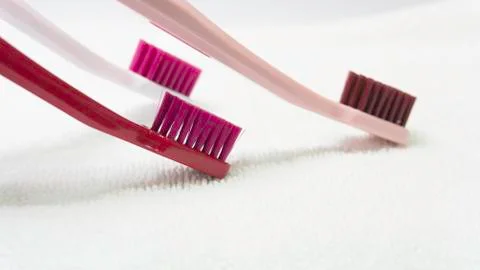 Colored Tooth brushes  isolated on the white background. Stock Photos