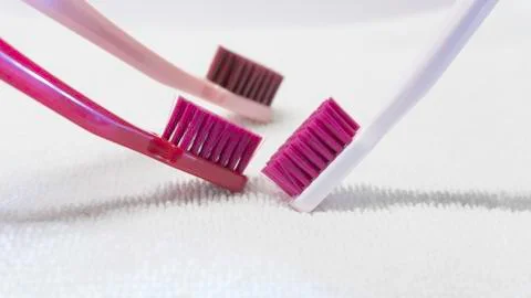 Colored Tooth brushes  isolated on the white background. Stock Photos