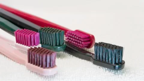 Colored Tooth brushes  isolated on the white background. Stock Photos