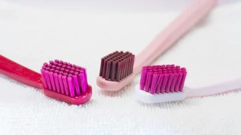 Colored Tooth brushes  isolated on the white background. Stock Photos
