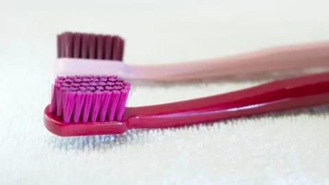 Colored Tooth brushes  isolated on the white background. Stock Photos