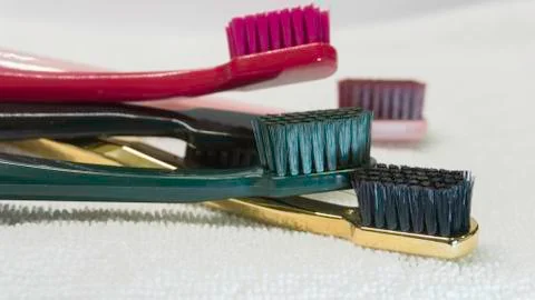 Colored Tooth brushes  isolated on the white background. Stock Photos