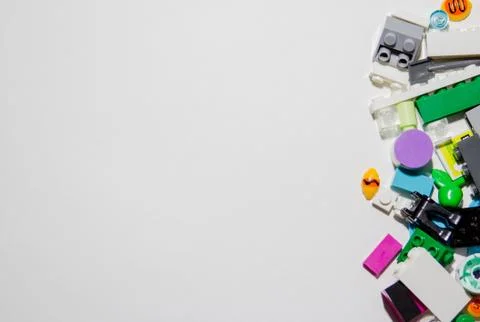 Colored toy bricks on white background. Playing lego concept. Stock Photos