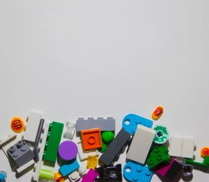 Colored toy bricks on white background. Playing lego concept. Stock Photos
