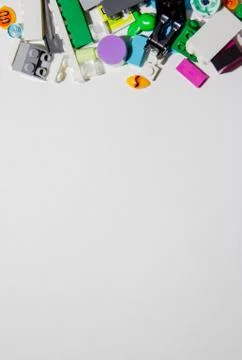 Colored toy bricks on white background. Playing lego concept. Stock Photos