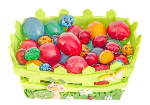 Colored traditional Easter eggs, chicken and quails, basket, close up, isolat Stock Photos