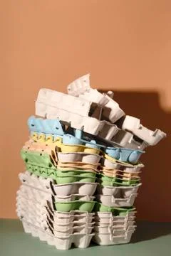 Colored trays from eggs. Garbage collection for recycling concept. Stock Photos