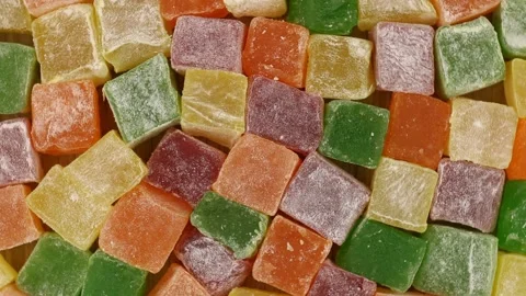 Colored Turkish delight rotates. Sweets close-up top view. Видео 152402422