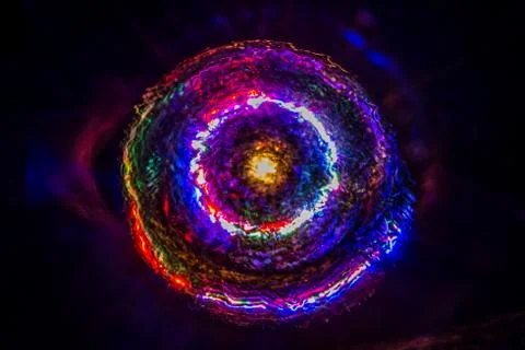 Colored vortex with a golden center Stock Illustration