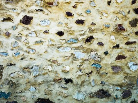 Colored wall made of stone. Stock Photos