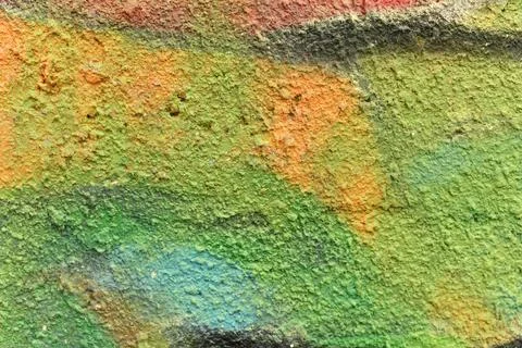 Colored wall texture multicolor paint graffiti background Stock Photos
