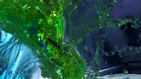 Colored water splash, Slow Motion Stock Footage 12161569