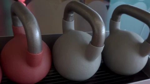 Colored weights, in the gym, for weightlifting Stock Footage 115055255