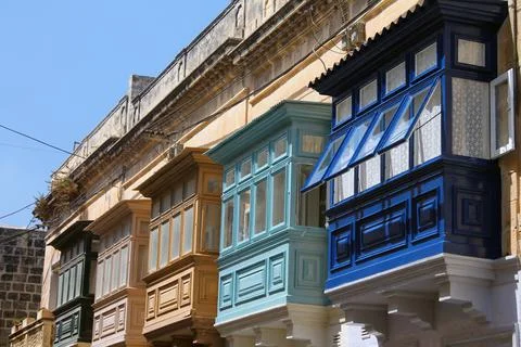 Colored windows in Mdina Stock Photos