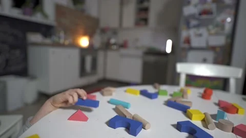 Colored wooden cubes on the table Stock Footage 169967927