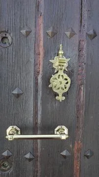 Colored wooden doors with metal knobs 스톡 사진