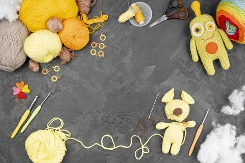 Colored wool with dolls copy space Stock Photos