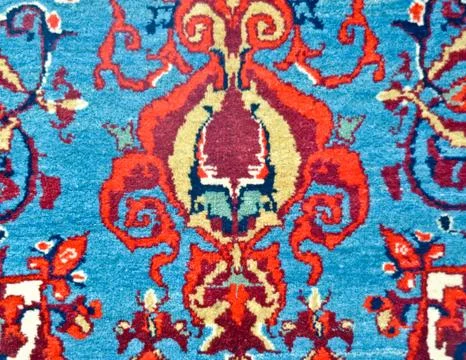 Colored wool handmade carpet closeup Stock Photos