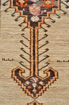 Colored wool handmade carpet closeup Stock Photos