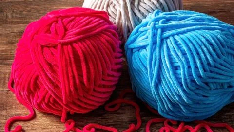 Colored wool threads for knitting 스톡 사진
