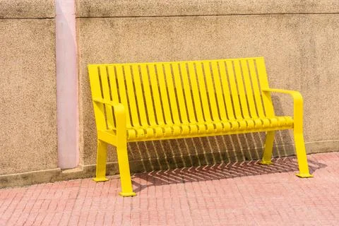 Colored yellow bench Stock Photos