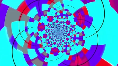 Colorful abstract animation background featuring a hypnotic rotating pattern Stock Footage 320144110