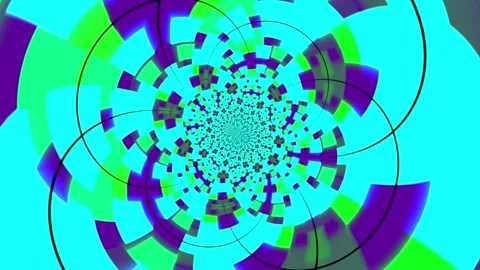 Colorful abstract animation background featuring a hypnotic rotating pattern Stock Footage 320144198