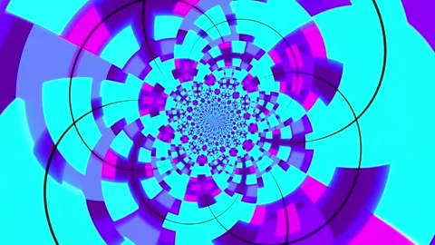 Colorful abstract animation background featuring a hypnotic rotating pattern Stock Footage 320144199