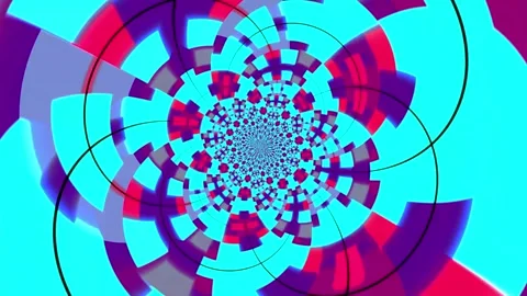 Colorful abstract animation background featuring a hypnotic rotating pattern Stock Footage 320144208