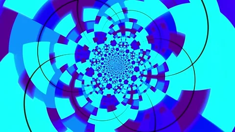 Colorful abstract animation background featuring a hypnotic rotating pattern Stock Footage 320144209