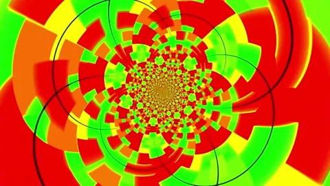 Colorful abstract animation background featuring a hypnotic rotating pattern Stock Footage 320144223