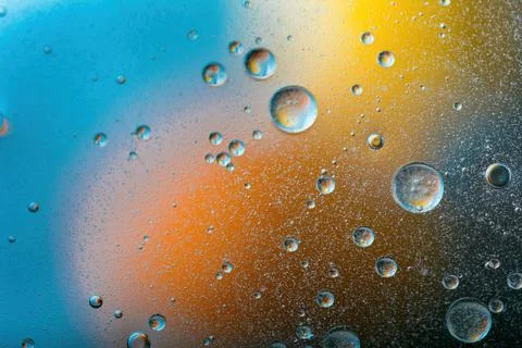Colorful abstract background. effect of colored oil circles and air bubbles o Stock Photos