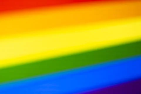 Colorful abstract background featuring blurred rainbow stripes representing Stock Illustration