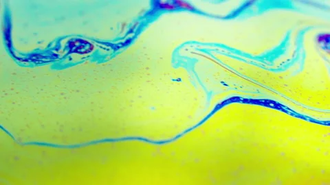 Colorful abstract background fluid rainbow colors in motion, macro shot Stockbeeldmateriaal 130245322