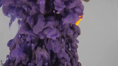 Colorful abstract patterns emerge from mixing liquids in water Video stock 320391868