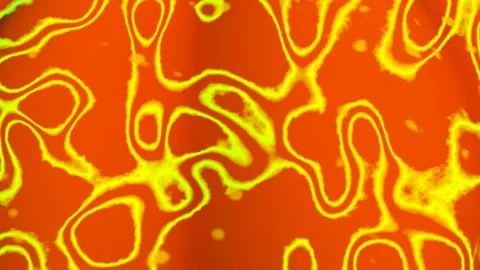 Colorful abstract patterns in orange and green displayed on a surface Stock Footage 346699348