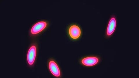 Colorful abstract shapes create motion on dark background Stock Footage 338023390