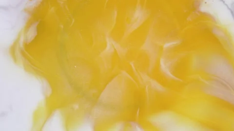 Colorful abstract texture of liquid marble, liquid art. Abstract yellow white Stock Footage 197431646