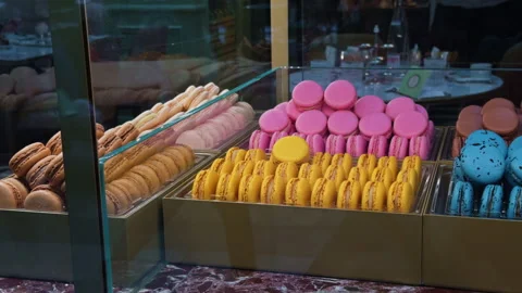 A Colorful and EyeCatching Macarons Display Carefully Arranged in a Pastry Shop Stock Footage 318556732