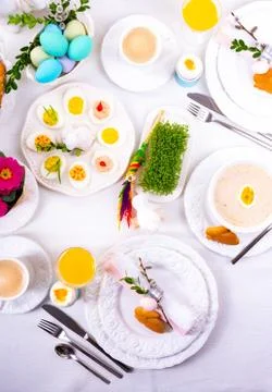A colorful and festive Easter table decoration Stock Photos