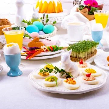 A colorful and festive Easter table decoration Stock Photos