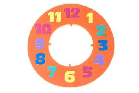 Colorful and round toy circle clock isolated in white background with clippin Stock Photos
