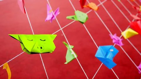 Colorful animal origami papers from kids hanging with white strings in playgr Stock Photos