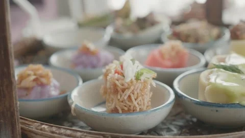 Colorful Array of Asian Cuisine in Small Bowls Stock Footage 318938578